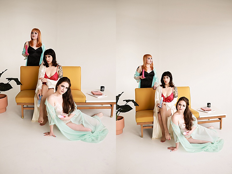 Gallery-of-three-women-sitting-on-a-yellow-couch-wearing-vintage-lingerie