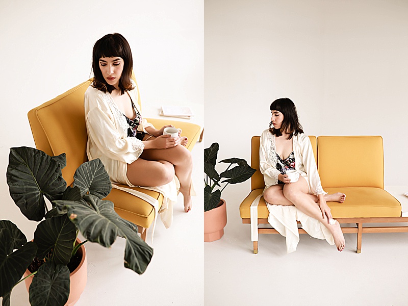 Gallery-of-a-woman-sitting-on-a-yellow-couch-wearing-vintage-lingerie