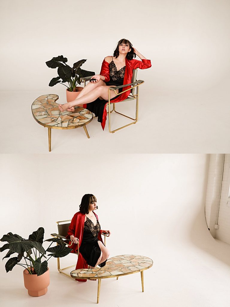 Gallery-of-woman-wearing-black-slip-with-red-rob-sitting-in-a-green-metal-chair