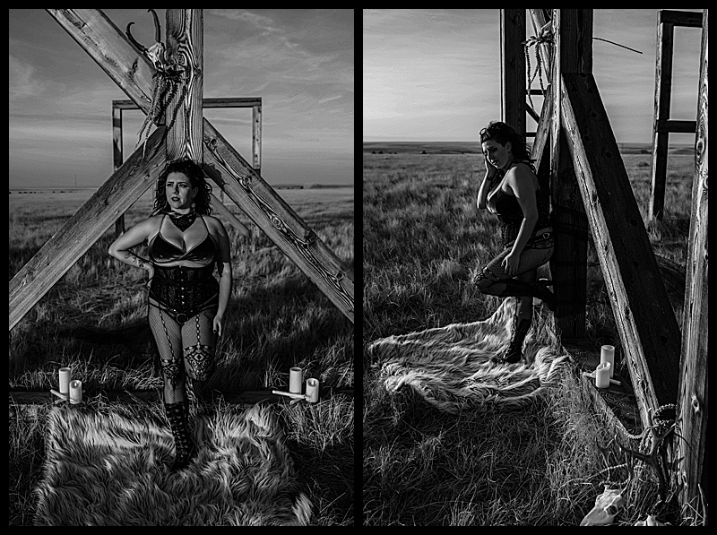 Witchy-women-dressed-in-lingerie-and-cloaks-posing-in-front-of-wooden-structures-in-the-middle-of-a-field