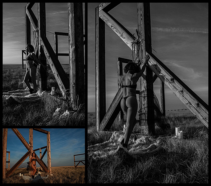 Witchy-women-dressed-in-lingerie-and-cloaks-posing-in-front-of-wooden-structures-in-the-middle-of-a-field