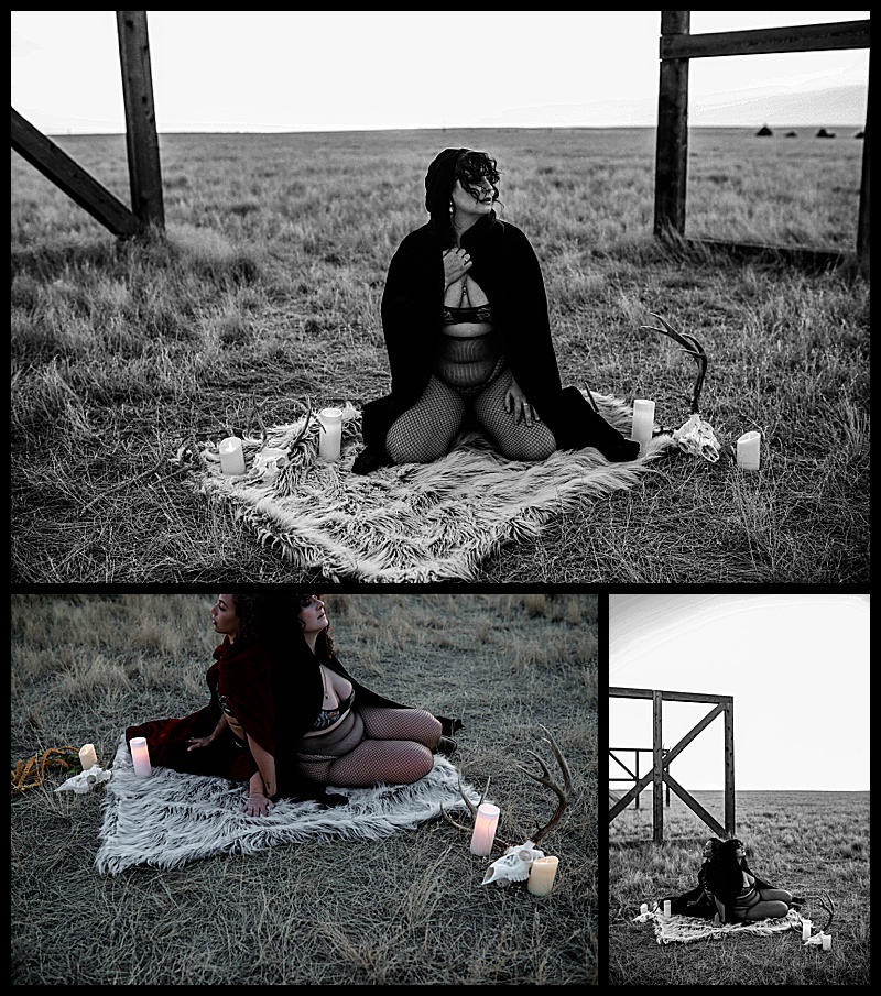 Witchy-women-dressed-in-lingerie-and-cloaks-posing-in-front-of-wooden-structures-in-the-middle-of-a-field