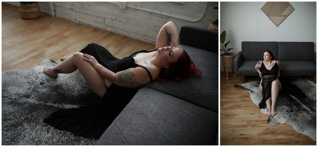 Colorado-boudoir-photos-of-a-woman-wearing-a-shear-black-dress-posing-on-the-floor-leaning-on-grey-couch