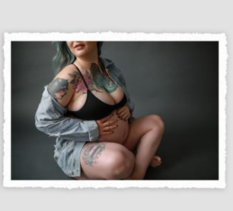 Torn edge maternity photo print of woman in denim jacket.